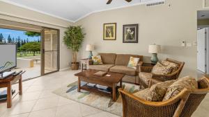 a living room with a couch and a table at Kapalua Golf Villa 15P78 in Kapalua