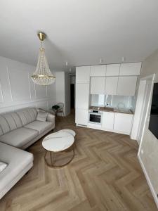 Kuchyň nebo kuchyňský kout v ubytování New apartment next to Warsaw + 19 fotografií