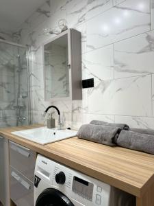 Fotografie z fotogalerie ubytování Kameralny Apartament z Balkonem v destinaci Szczytno + 13 fotografií