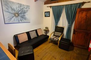 Posezení v ubytování Algarrobo Cabaña a 2 cuadras Playa El Canelo+Wifi
