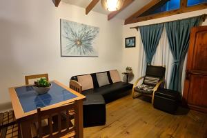 Posezení v ubytování Algarrobo Cabaña a 2 cuadras Playa El Canelo+Wifi