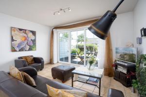 Posezení v ubytování Strand Domizil Wohnung 2