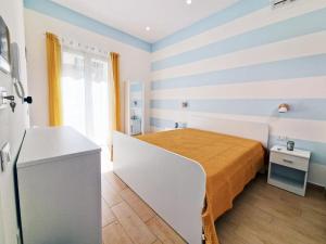 Postel nebo postele na pokoji v ubytování Casa Mo'