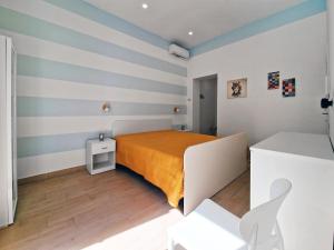 Postel nebo postele na pokoji v ubytování Casa Mo'