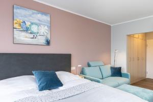 Postel nebo postele na pokoji v ubytování Strandhotel Laboe Nr 21