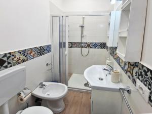 Koupelna v ubytování Casa Mo' + 9 fotografií