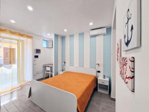 Postel nebo postele na pokoji v ubytování Casa Mo'