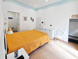 Postel nebo postele na pokoji v ubytování Casa Mo'