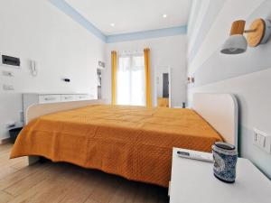 Postel nebo postele na pokoji v ubytování Casa Mo'