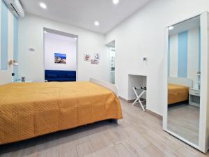 Postel nebo postele na pokoji v ubytování Casa Mo'