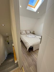 Postel nebo postele na pokoji v ubytování Appartement en Champagne + 5 fotografií
