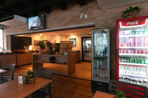 Nápoje v ubytování EZ Moema Hotel