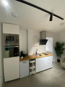 Η κουζίνα ή μικρή κουζίνα στο Residencial Smart HOmes