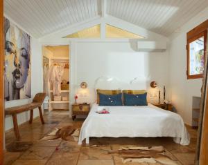 Cama ou camas em um quarto em The Chili Beach Private Resort