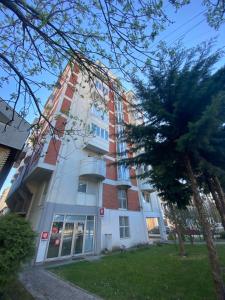 a white building with a red brick at Casa Clara in Ohrid +4 photos