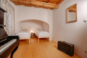 Letto o letti in una camera di Apartmány Nathan