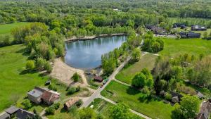 an aerial view of a village with a lake at Apartment Rehwiese in Burg