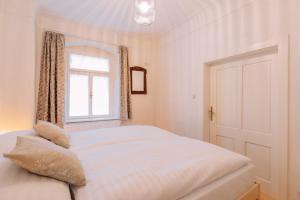 Letto o letti in una camera di Apartmány Nathan