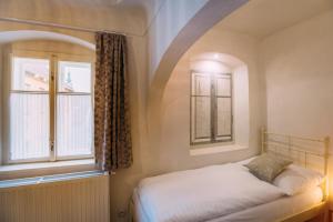 Letto o letti in una camera di Apartmány Nathan