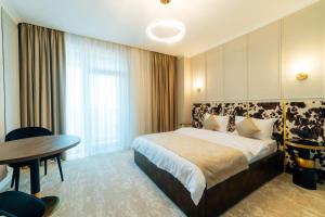 Ένα ή περισσότερα κρεβάτια σε δωμάτιο στο Casa Budisteanu 3