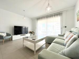 Televízia a/alebo spoločenská miestnosť v ubytovaní New apartment in Calpe