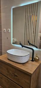 Ванна кімната в Apartment Gold & Gray
