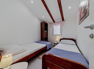 Posteľ alebo postele v izbe v ubytovaní Stone House Blaca