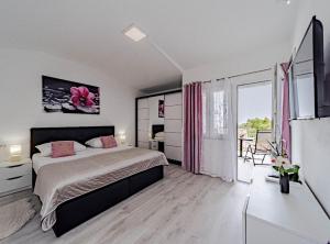 Posteľ alebo postele v izbe v ubytovaní Stone House Blaca