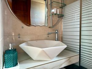 A bathroom at Driopes Villas