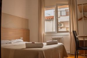 Postel nebo postele na pokoji v ubytování Can Setmanes by CozyCatalonia
