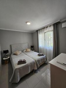 Postel nebo postele na pokoji v ubytování APARTAMENTO VERA COAST 123