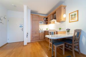 Kuchyň nebo kuchyňský kout v ubytování Sonnenpark- Wohnung 5