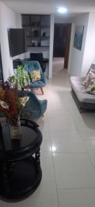 Posezení v ubytování Habitación cerca Sena-Uis