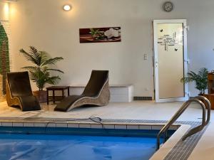 Der Swimmingpool an oder in der Nähe von Ihr Ferien Hotel Brunnenhof
