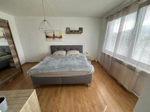 Postel nebo postele na pokoji v ubytování Apartmán Na Šestce