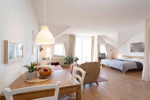 Postel nebo postele na pokoji v ubytování Kaiserhof 42-44 Dünenrose
