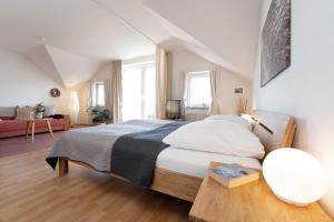 Postel nebo postele na pokoji v ubytování Kaiserhof 42-44 Dünenrose