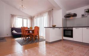 Kuchyň nebo kuchyňský kout v ubytování Apartments Tresan