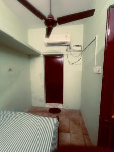 Postel nebo postele na pokoji v ubytování Smk Mukil Homestay