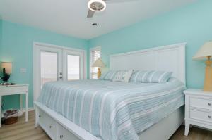 A bed or beds in a room at What a View by Bryant Real Estate