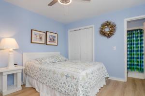A bed or beds in a room at What a View by Bryant Real Estate