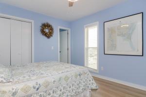 A bed or beds in a room at What a View by Bryant Real Estate