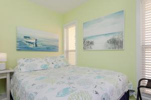 A bed or beds in a room at What a View by Bryant Real Estate