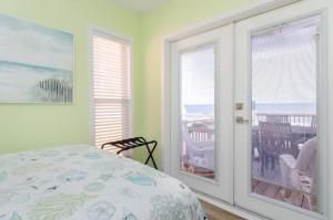 A bed or beds in a room at What a View by Bryant Real Estate