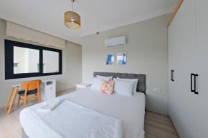 Postel nebo postele na pokoji v ubytování Villa Aromatherapy