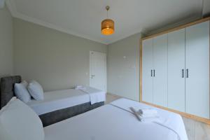 Postel nebo postele na pokoji v ubytování Villa Aromatherapy