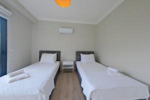Postel nebo postele na pokoji v ubytování Villa Aromatherapy