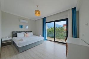 Postel nebo postele na pokoji v ubytování Villa Aromatherapy