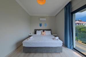 Postel nebo postele na pokoji v ubytování Villa Aromatherapy