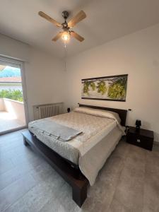 Un pat sau paturi într-o cameră la Villa Livia